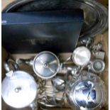 A silver plated part tea set, another teapot, toast rack and boxed coasters, etc.