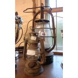 Two vintage hurricane lamps