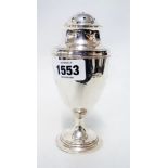 A 16cm Edwardian silver sugar caster by William Comyns & Sons of goblet form with push fit top -