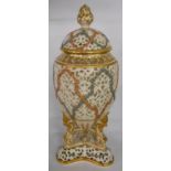 A 19th Century Graingers Worcester reticulated ovoid vase on mask and scroll trefoil base with