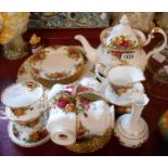 A Royal Albert Old Country Roses pattern tea set comprising six trios, bread and butter plate,