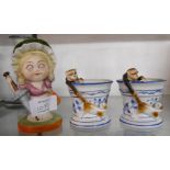 A pair of Conta Boehme novelty monkey and cat spill vases - sold with a German painted bisque