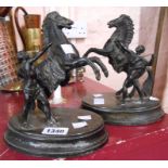 A pair of small Victorian spelter Marly horses