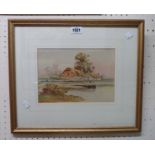 A gilt framed watercolour, depicting waterside thatched cottages with church beyond - signed