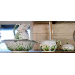 A Victorian china jug and bowl set with chamber pot and soap dish, the spout and handle of the jug