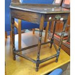 A 74cm early 20th Century stained oak Credence style hall table with central frieze drawer set on