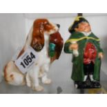 A Royal Doulton bone china model of a Cocker Spaniel with a pheasant in its mouth HN 1029 - sold