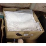 A box containing a quantity of linen