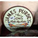 A reproduction painted cast iron Purdey sign