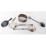 Two silver seal top spoons, a marked 90 Chinese white metal spoon, miniature hand mirror and