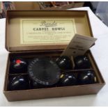 A vintage boxed set of Banda carpet bowls