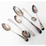 Three Georgian silver teaspoons, another, a Georgian dessert spoon and shell pattern salt spoon