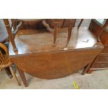 A 1.13m antique mahogany drop-leaf dining table, set on moulded square legs