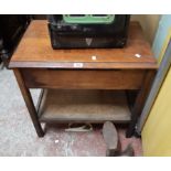 A 66cm 1930's stained oak two tier tea trolley with drawer - casters missing