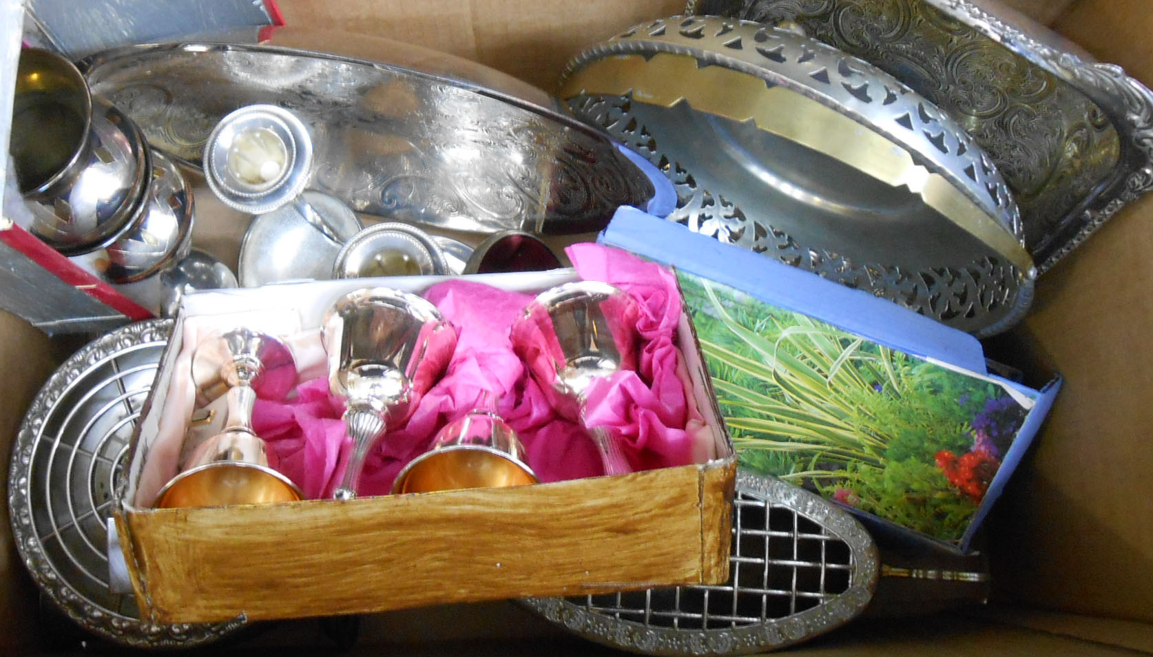 A box of silver plated items including rose bowls, candelabra, pair of reproduction Egyptian pots,