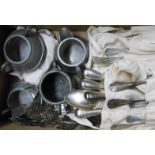 Various wraps containing assorted silver plated cutlery - sold with a silver plated nurse's belt and