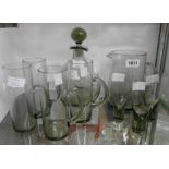 Nine pieces of 1960's Danish Holmegaard glassware comprising Per Lutken Danica smokey glass decanter