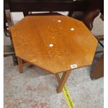 A 60cm 1930's oak octagonal topped tea table, set on simple square supports