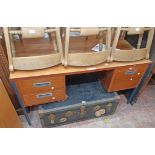 A 1.36m vintage teak effect kneehole office desk with two short drawers and flanking locking file