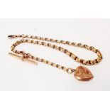 A marked 9ct faceted graduated link Albert watch chain with T-bar, fob clip and a damaged front
