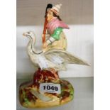 A 19th Century Staffordshire figure Mother Goose