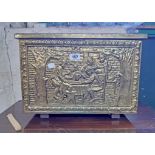 A 20th Century embossed brass clad coal box with carousing scene to lid and front