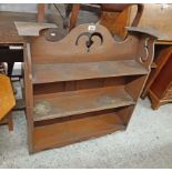 A 75cm late Victorian oak wall mounted three shelf unit with pierced decoration to top and sides