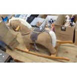 A Mamas & Papas small child's plush rocking horse