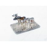 A miniature Swedish 830 grade white metal paperweight in the form of two Reindeer