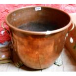 A copper log bucket