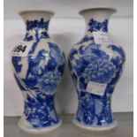 A pair of small antique Chinese blue and white painted vases depicting birds amid chrysanthemums -