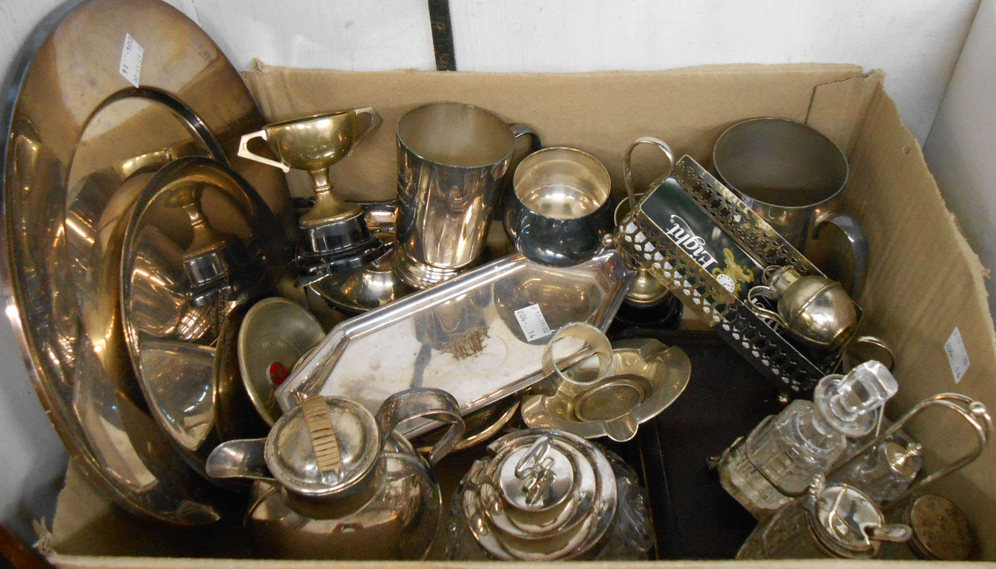 A quantity of silver plated items including various sporting trophy plates, ashtrays, cruet set,