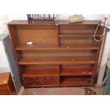 A 1.53m 20th Century two part open bookcase unit with added cupboard to base - marriage
