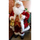 A large Bradford Exchange Thomas Kincade Masterpiece Santa Claus with recording of The Night