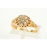 AN EARLY 20TH CENTURY 18CT GOLD DIAMOND CLUSTER RING, designed as a central old European cut diamond