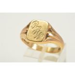 A 9CT GOLD SIGNET RING, the front rectangular panel with engraved scrolling initials, to the tapered