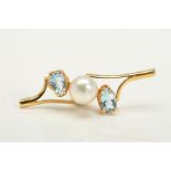 A 9CT GOLD CULTURED PEARL AND TOPAZ PENDANT, designed as a central cultured pearl with a pear-
