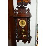 AN EARLY 20TH CENTURY MAHOGANY WALL CLOCK (winding key)