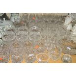 A COLLECTION OF CUT GLASS, some 'Tudor', most unmarked, including wine glasses, sherry glasses,