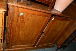 AN EDWARDIAN WALNUT PANELLED TWO DOOR CUPBOARD, width 122cm x depth 45cm x height 97cm (s.d.)