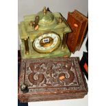 A 20TH CENTURY GREEN ONYX MANTEL CLOCK, temple shaped case with brass columns, Arabic dial,