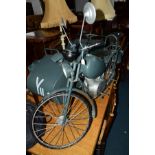 A BESPOKE METAL MODEL OF A MID 20TH CENTURY BIKE AND SIDECAR