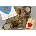 A TIN OF MAINLY COINS, to include two cased five shilling coins, further old currency including