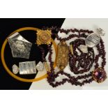 A SELECTION OF JEWELLERY, to include two garnet necklaces, a plastic bangle, a purple paste
