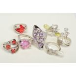SEVEN CUBIC ZIRCONIA AND GEM RINGS, to include an up finger ring collet set with various shaped