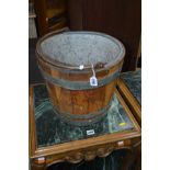 A 19TH CENTURY OAK COOPERED WATER BUCKET
