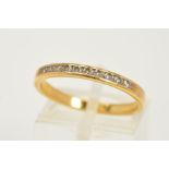 A MODERN DIAMOND ETERNITY RING, a half eternity band, diamonds channel set, approximate diamond