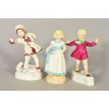 THREE ROYAL WORCESTER FIGURES to include 'Monday's Child' RW3257, 'January' RW3452 and 'December'