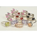 TEN CUBIC ZIRCONIA AND PASTE RINGS, five of branched cross over design, two set with coloured square