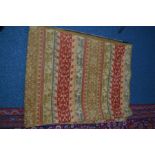 A LAURA ASHLEY GILT FOLIATE GROUND RUG together with two other rugs (3)